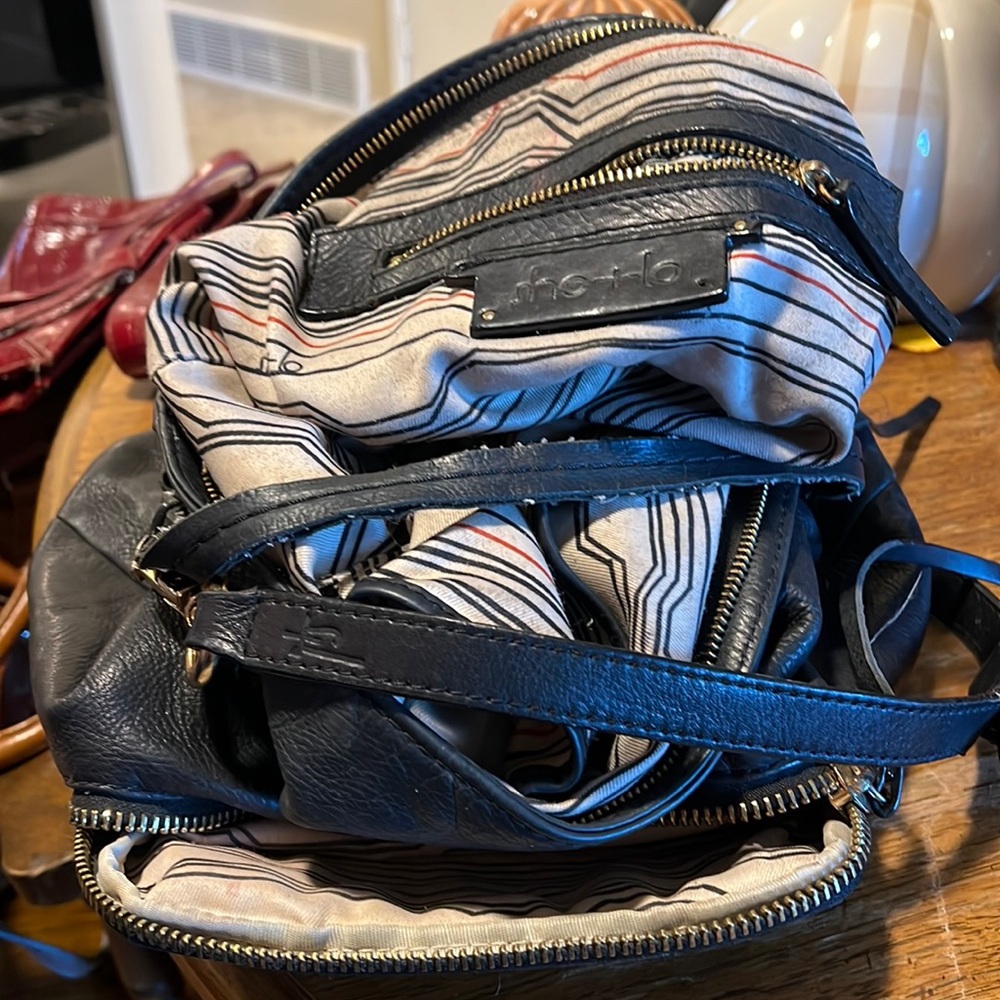 She-lo black studded shoulder bag